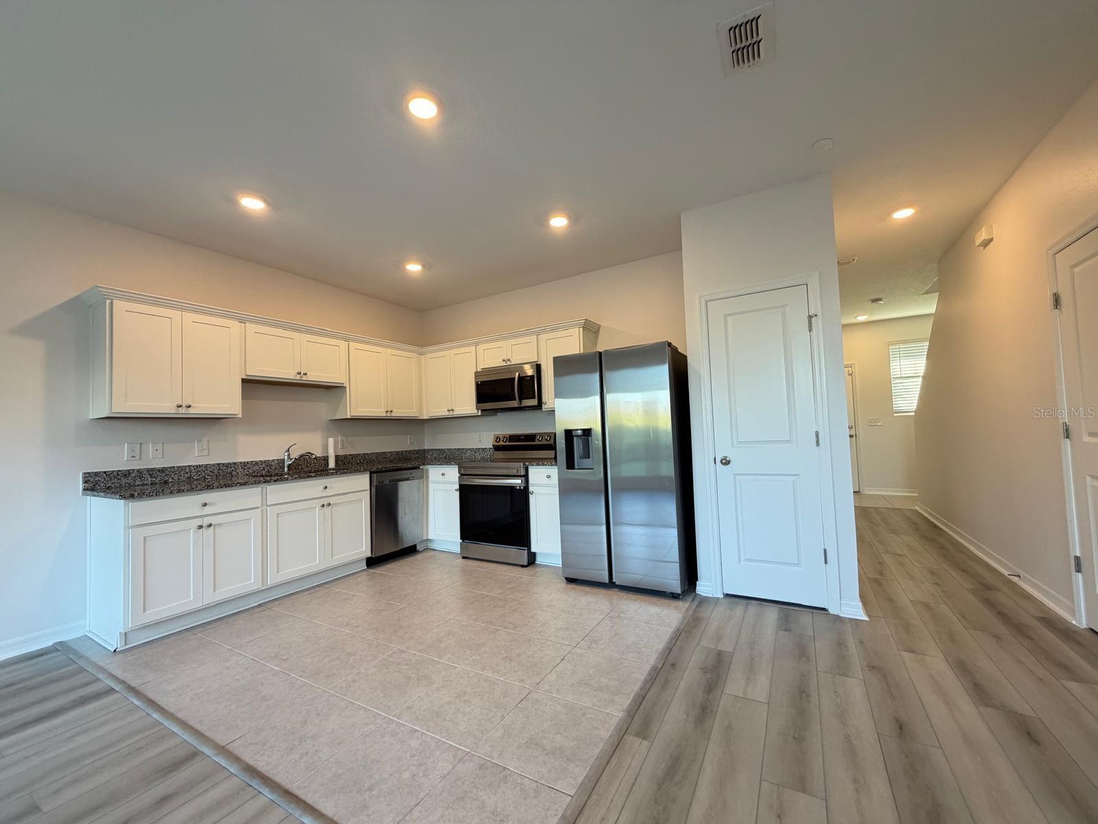 Kitchen with included appliances